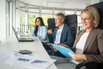 Multiethnic business people working together in the office