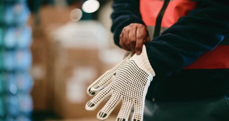 Logistics, worker or hands with gloves in warehouse, increase grip or safety compliance for package transport. Shipping, bokeh or person with gear for chemical exposure, impact protection or protocol - Powered by Adobe