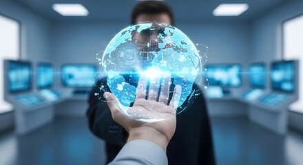 Man holding digital globe in control room with multiple screens displaying information in background