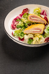 Cordon bleu cutlet meat dish French cuisine vegetable dish natural product tasty snack fresh delicious gourmet food background on the table rustic top view copy space