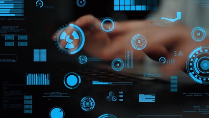 A modern workspace featuring hands typing on a keyboard, surrounded by various digital graphs and metrics in soft blue tones, showcasing advanced data visualization technology. Xenic