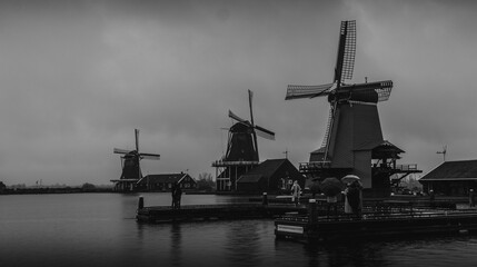 windmill in the netherlands in black and white