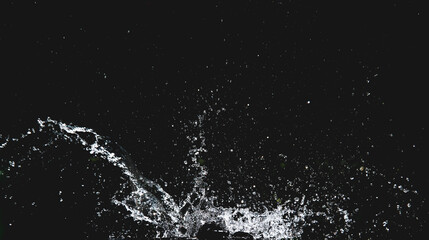 Dynamic Water Splash: A striking shot of water exploding against a dark backdrop, creating a captivating visual effect. © Stock4u2024 