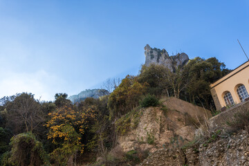 Mountain with a building in the background