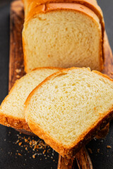 Brioche bread slices bakery pastry natural product tasty snack fresh delicious gourmet food background on the table rustic top view copy space