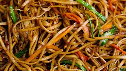 Stir-Fried Noodles - Mixed Vegetable Asian Style Dish in Warm Seasoned Blend