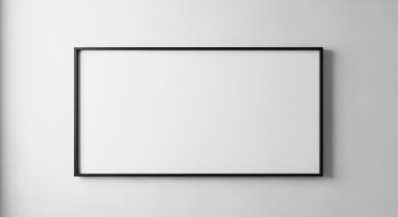 Blank black picture frame on a textured white wall, ready for custom content or design