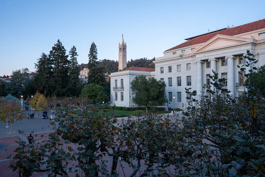 Berkeley, CA, USA - Nov 19, 2023: The Sproul Plaza in front of the Sproul Hall on the UC Berkeley campus in Berkeley, California, at dusk. The iconic Sather Tower is seen in the background.