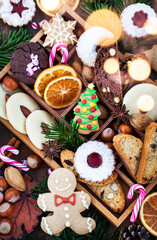 Sweet Christmas cookies in wooden box on rustic table