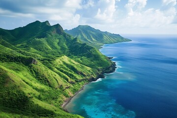 Aerial view of mountains, lush green landscapes, and the ocean