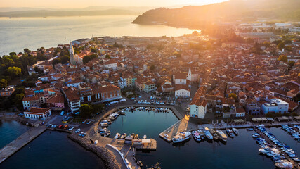 The town of Koper at dawn, seen from above. Aerial view of the Slovenian coastal tourist town on the Adriatic sea