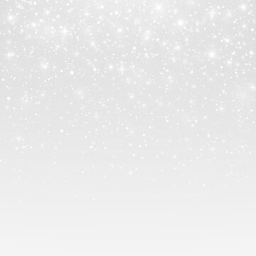 Abstract holiday background with glistering glitter and sparkling particles.
