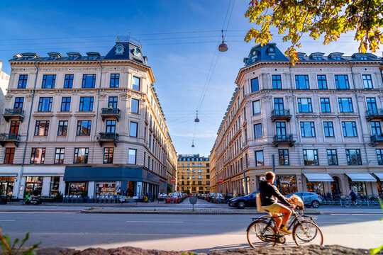 People on bicycles in Copenhagen , popular mode of transport in Denmark. Life on streets Scandinavian city.	

