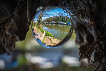 River Medway between Maidstone and Allington Lock in Kent, England shot through a lens / crystal ball
