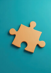 Obraz premium Single orange puzzle piece on teal background