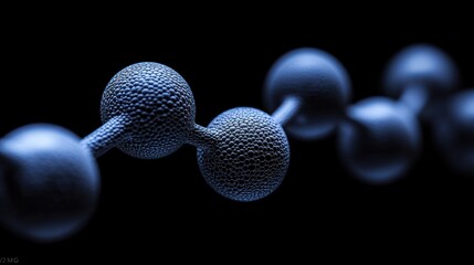 Dark image of a chain of textured spheres