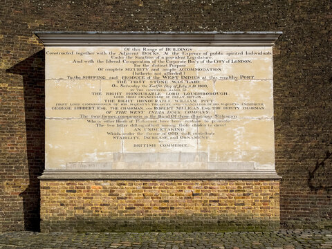 LONDON, UK - APRIL 05, 2018: Memorial plaque on wall at West India Quay commemorating the building the Docks by the West India Dock Company