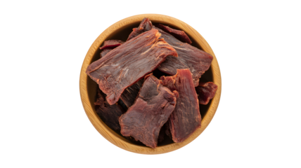 Savory jerky pieces piled high in a rustic wooden bowl, offering a delicious and protein-rich snack for any adventure or workday.