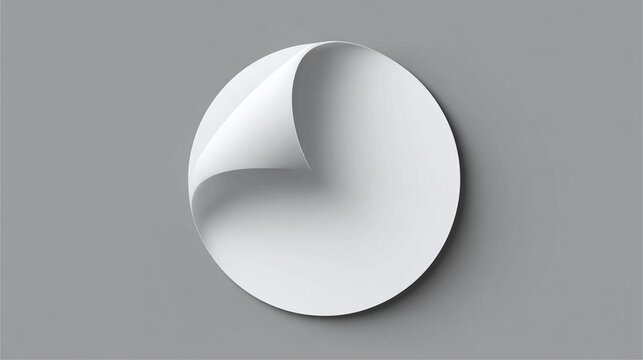 A Round Sticker with a curled edge on gray background