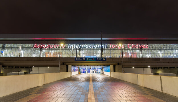 Callao, Peru - September 10, 2025: The illuminated facade and entrance of Jorge Chavez International Airport (LIM) in Lima, Peru, at night