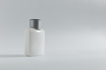 white bottle of perfume