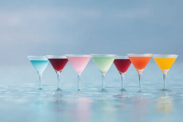 capture artistic representation of top  famous cocktails by pool or sea