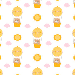 Cute, bright children's pattern with a bear flying in a hot air balloon