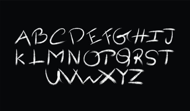 chalkboard displaying the complete english alphabet in white showcasing handwritten lettering style and educational content