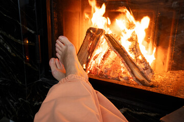 Naklejka premium The warmth and comfort created by the glowing fire is simply perfect for enjoying a relaxing evening indoors