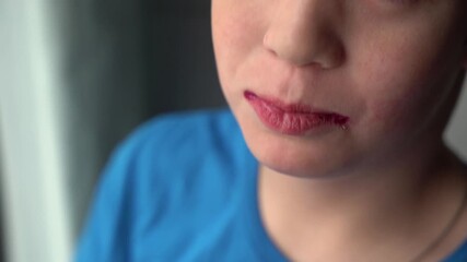 Child enjoying colorful donut, capturing the joyful moment of anticipation, camera zooms in on expression and details of the treat, showcasing excitement and delight