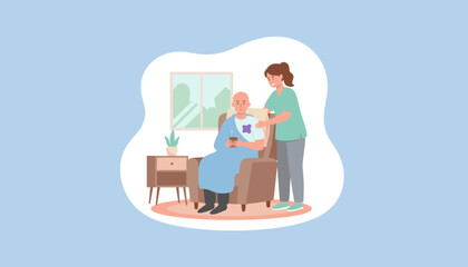 Nurse comforts a bald cancer patient sitting in an armchair during home recovery