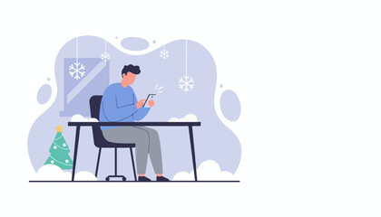 Digital communication during winter holidays Man sitting at a desk scrolling on his phone