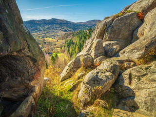 Obraz premium panoramic view to mountains valley in sunny autumn day in Carpathian in Ukraine