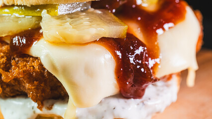 Korean fried chicken katsu burger with panko-crusted thigh, brioche bun, special sauces, pickles, and cheese. Crispy, juicy, and packed with flavor. Asian fusion delight.