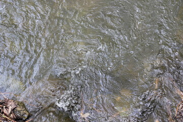 water flowing into the river