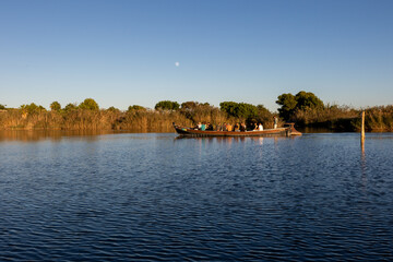 Tourists enjoying boat trip on albufera lake