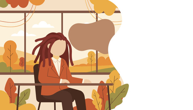 Professional woman with dreadlocks sitting by a window overlooking autumn nature
