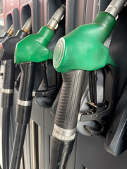 Modern, clean gas station with multiple fuel pumps and convenience store entrance, ideal for themes of travel, transportation, and energy infrastructure