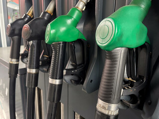 Refilling equipment at a gas station, close up. Filling station, petrol station, fuel station, gasoline station, refueling station