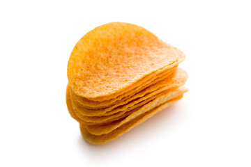 Crispy potato chips isolated on white background.
