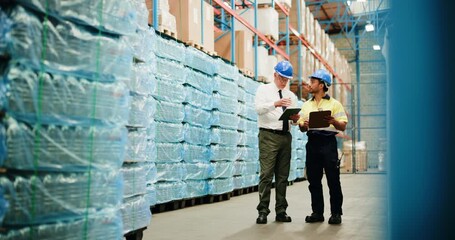 Distribution, documents and men in warehouse, tablet and teamwork with checklist for inventory. People, discussion and employees in factory, manufacturing and report for logistics and supply chain - Powered by Adobe