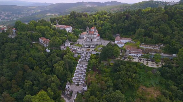  Aerial footage of Sanctuary Of Bom Jesus Do Monte, Braga, Potugal.Located on the slopes of Mount Espinho, overlooking the city of Braga, this cultural landscape evokes Christian Jerusalem.