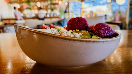Vibrant Vegan Buddha Bowl with Quinoa, Falafel, and Fresh Vegetables