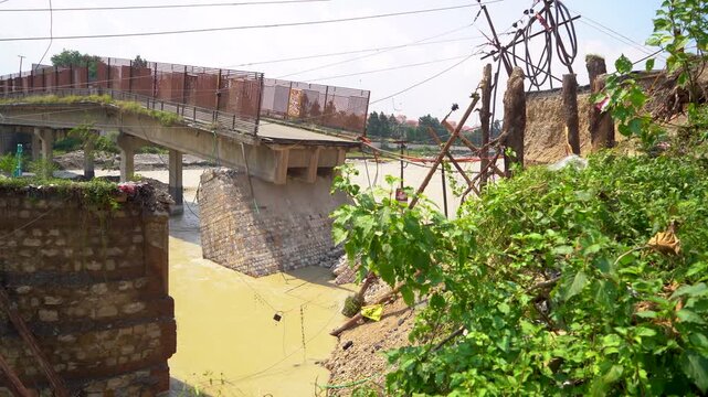 View of flood hit areas with broken bridge in Dehradun India