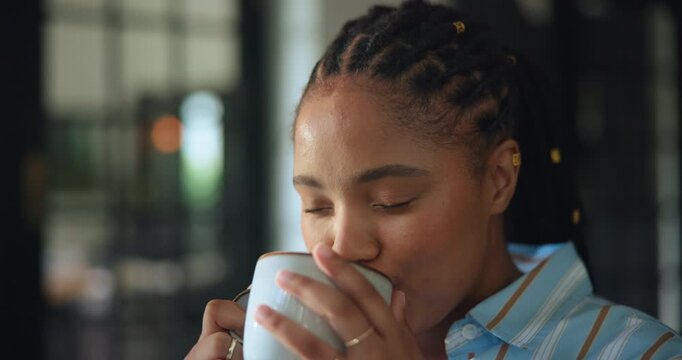 Coffee, aroma and woman in home, calm and start day with warm beverage, thinking and happy on break. Morning, mindfulness and black person with tea for health benefits, smelling and caffeine boost