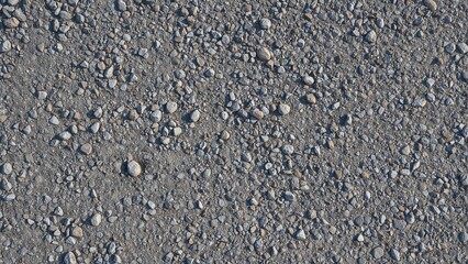 Close-up of rocky ground with scattered stones and gravel.