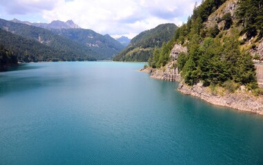 breathtaking view of Lake Sauris among the Alps in Northern Italy in the Friuli Venezia Giulia Region