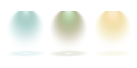 Three distinct colored spotlights illuminating a dark background with soft light beams