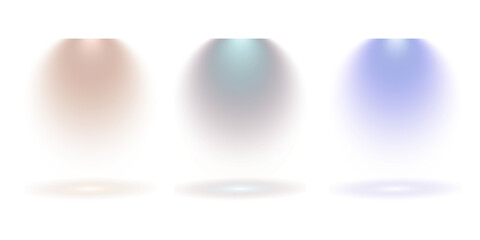 Three distinct spotlights illuminate a dark background with warm cool and blue light beams