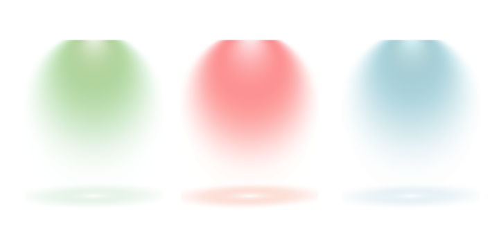 Three colorful spotlights shining down on a dark stage creating bright beams of light